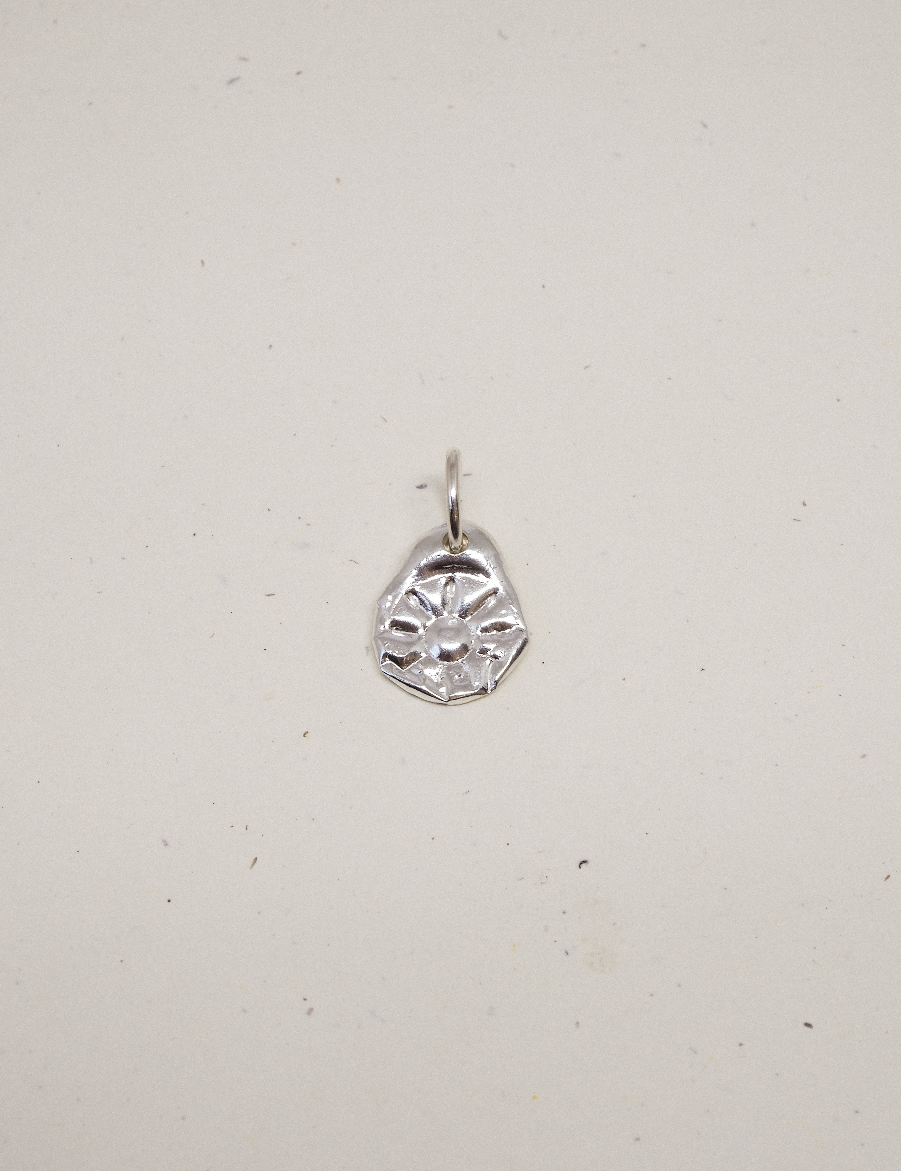 the sun charm
